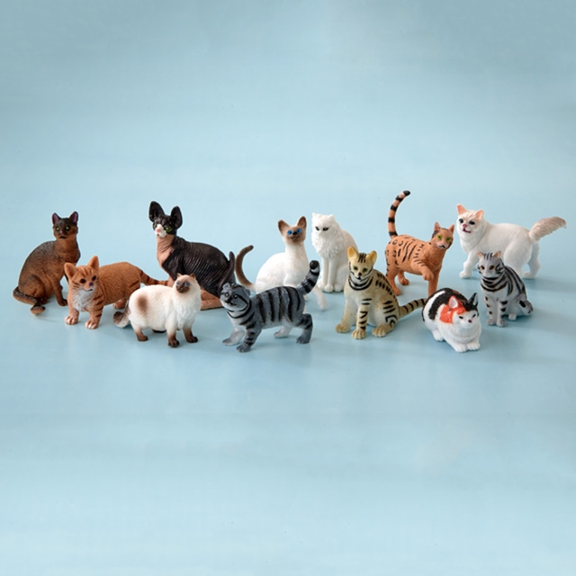 12 statuette di gatti