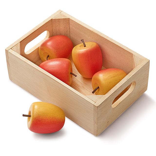 Pommes dans petit harasse en bois