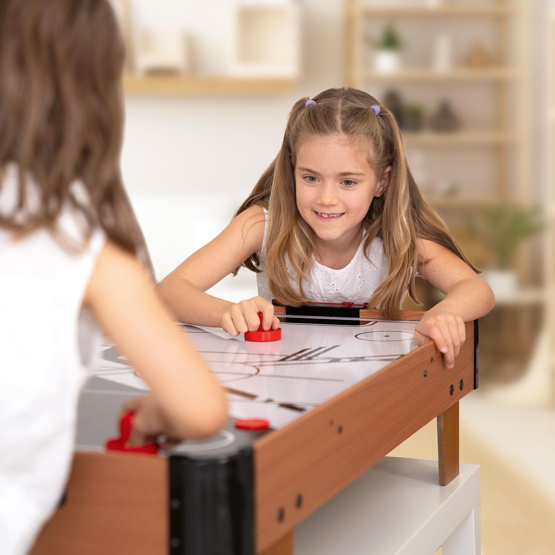 Airhockey Tischspiel von BEA Toys, mit zwei roten Schiebern und zwei Pucks