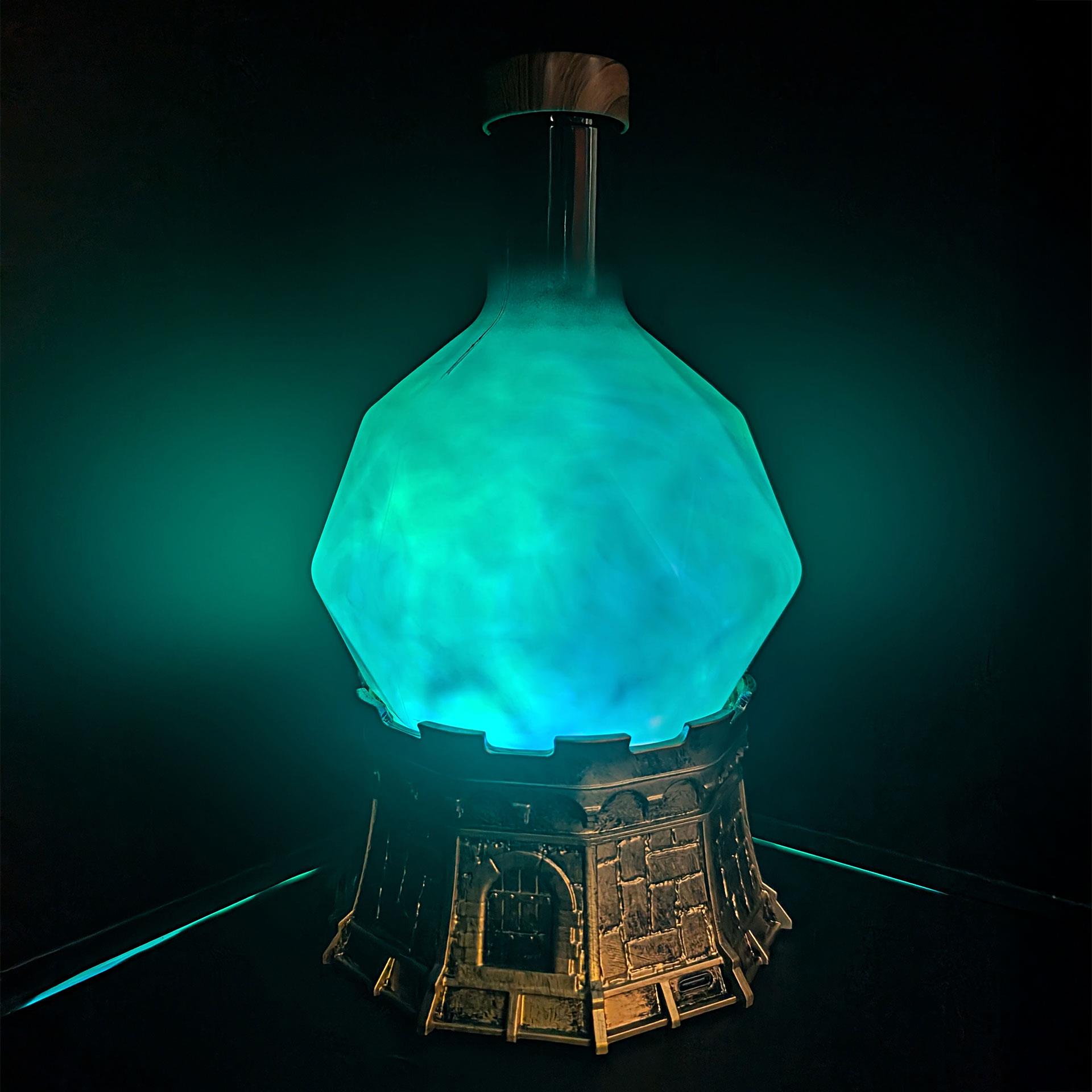Blaue Halloween Leuchte in Form einer Zaubertrankflasche mit wirbelndem Licht