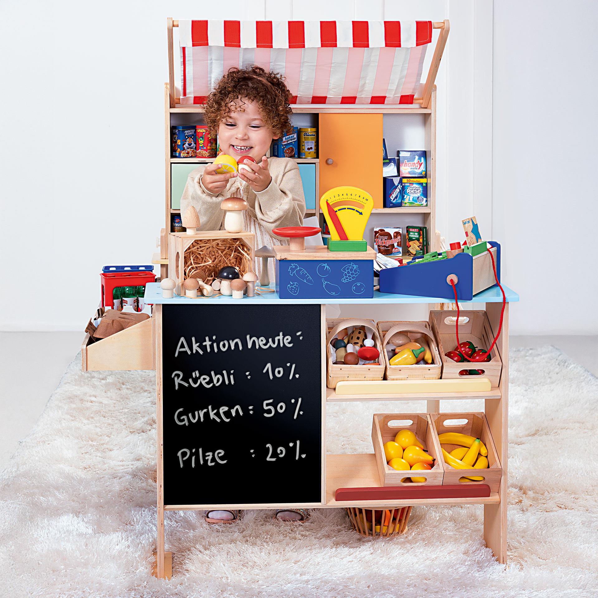 Étal de marché en bois pour enfants avec toit rayé rouge et blanc, tableau et étagères