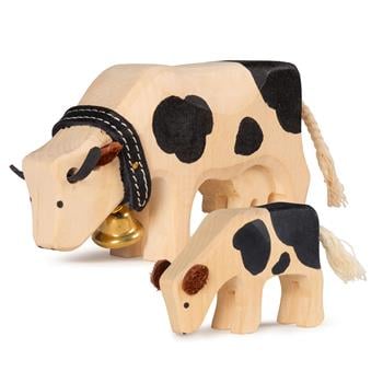 Vache fribourgeoise en bois et son petit veau broutant