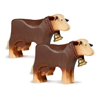 Zwei braune Schweizer Kühe aus Holz
