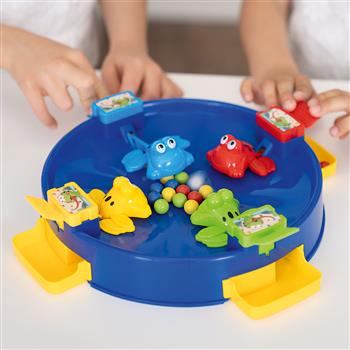 Jeu rond pour enfants avec quatre grenouilles sauteuses colorées et des billes colorées, dans lequel les joueurs attrapent des boules en appuyant sur un bouton – jeu de société pour 4 enfants