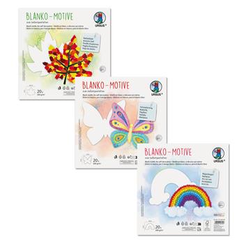 Weisse Bastelmotive aus Karton in Form von Regenbogen, Schmetterling und Ahornblatt