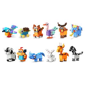 12 set da scrittura con blocchi da costruzione a forma di animali con diversi temperini a forma di animali da assemblare, oltre a matite e gomme da cancellare in una scatola colorata